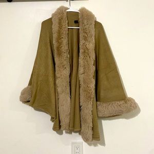 Neutral cape with sleeves and fur